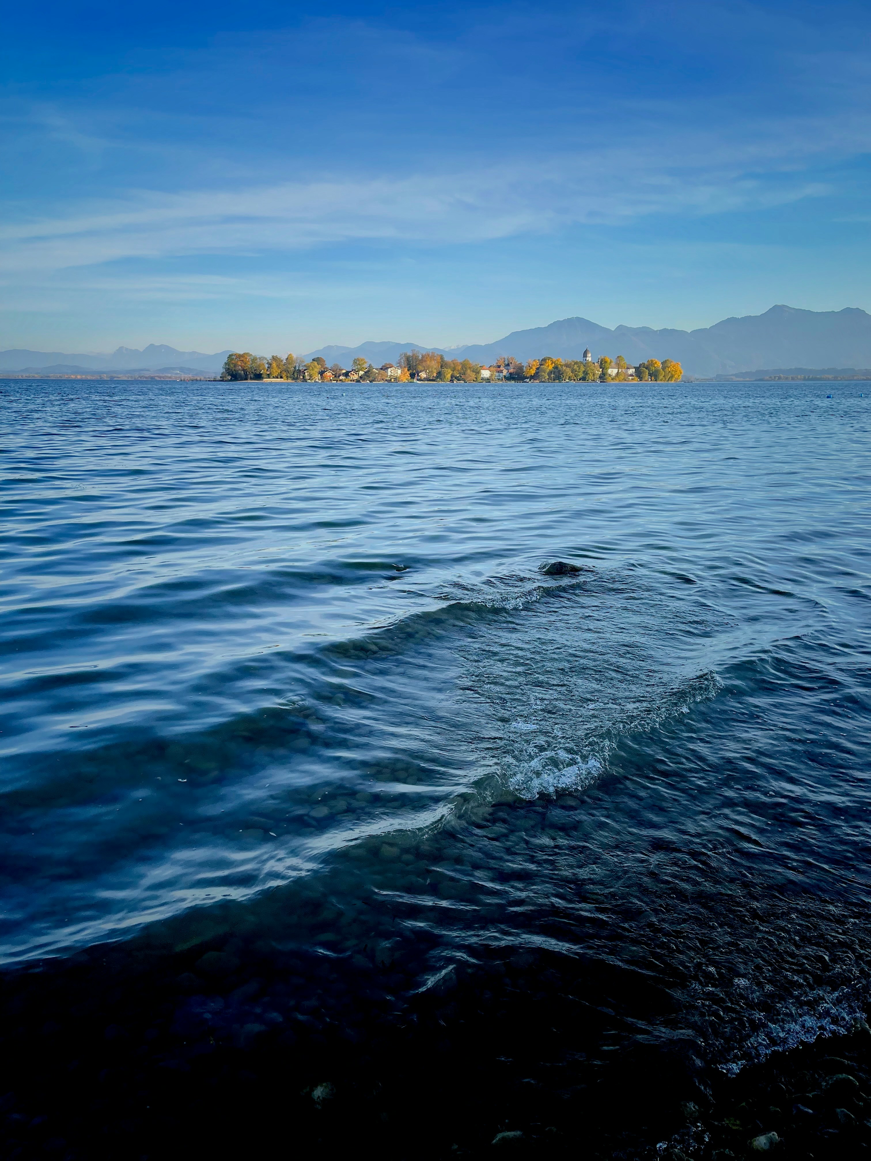 a body of water with a land in the distance