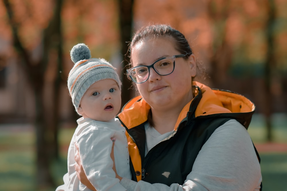 a person holding a baby