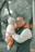 a person holding a baby