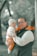 a person holding a baby