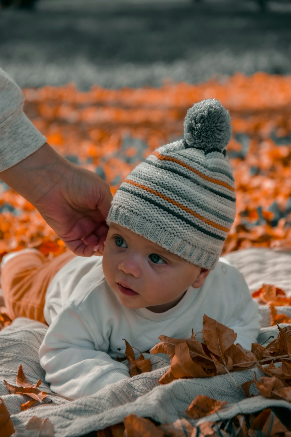 a baby in a knit hat