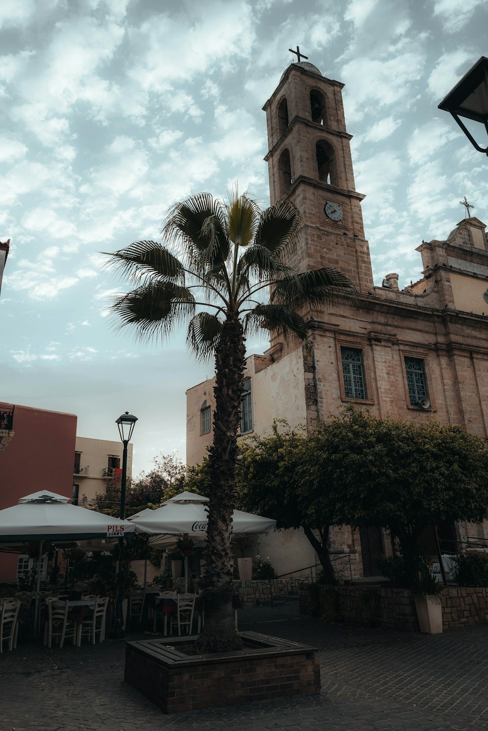 a church with a clock on the side of a building