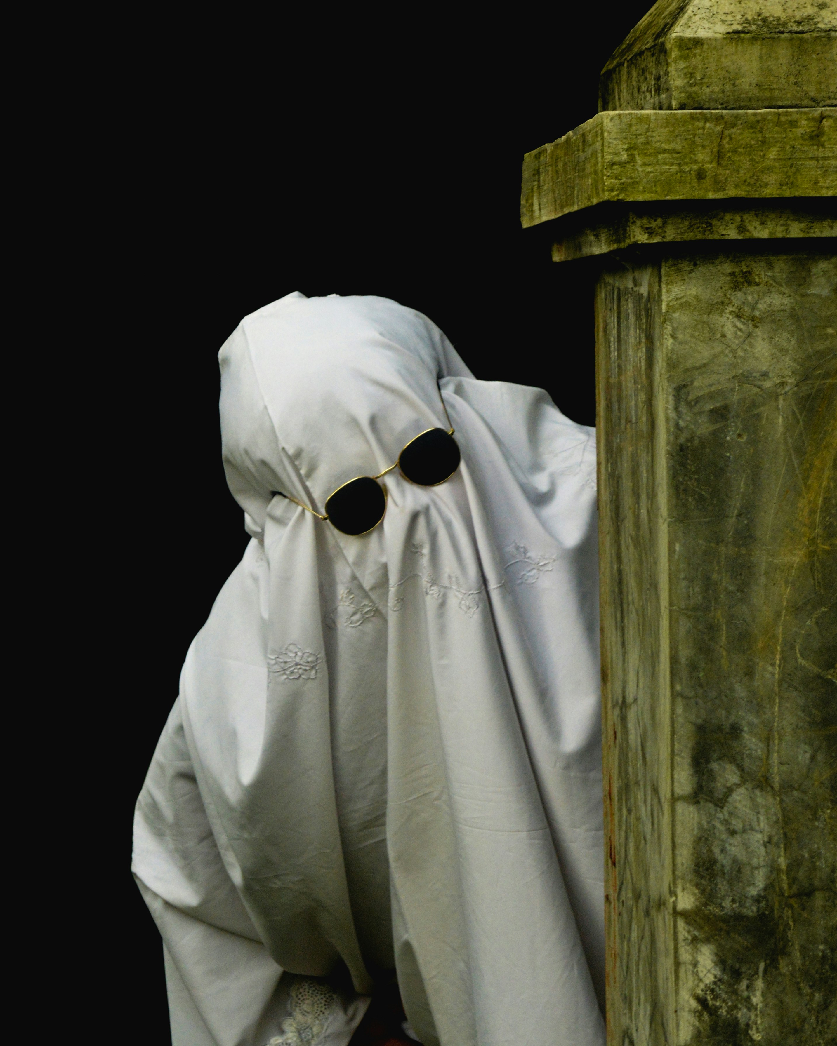 a statue of a person wearing a mask