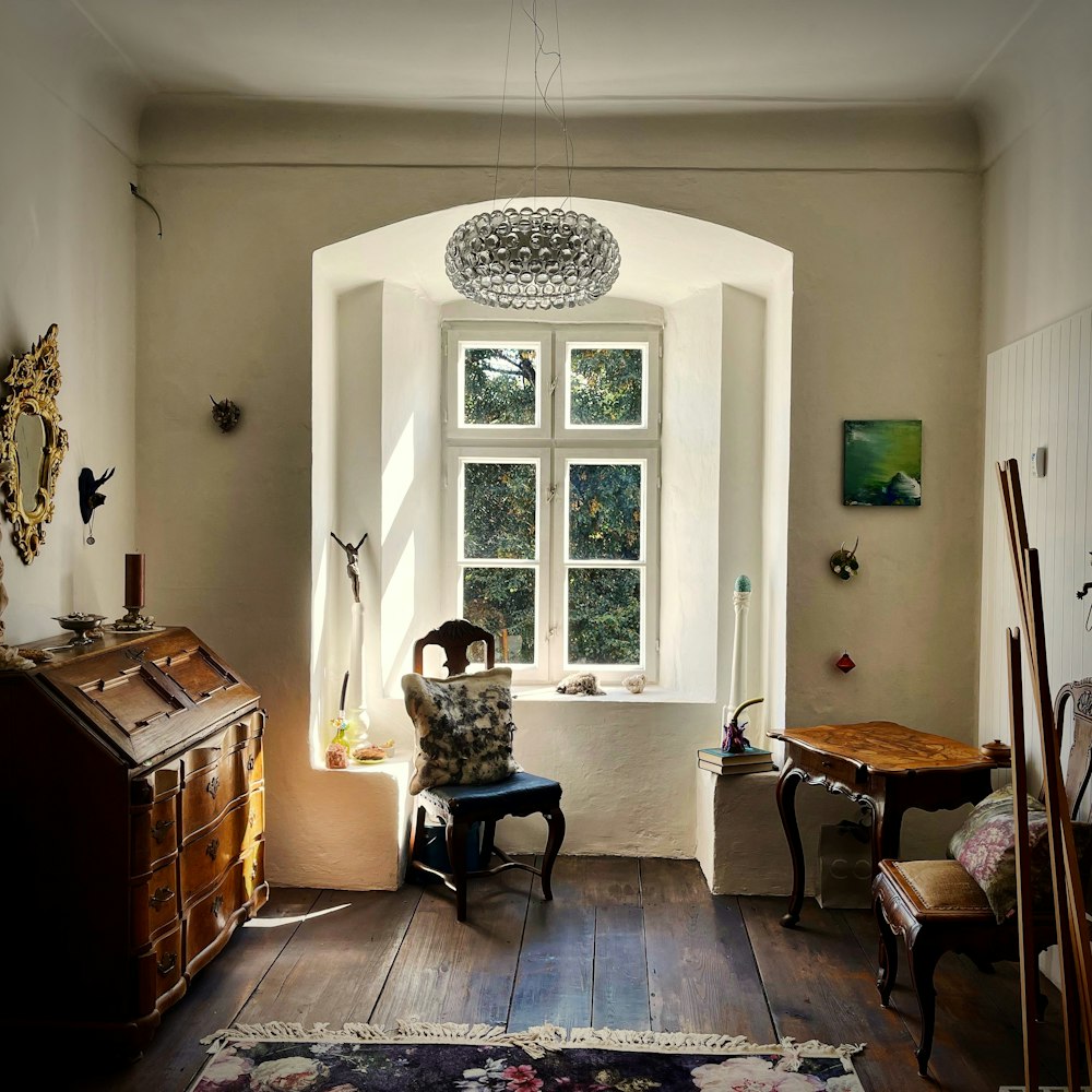 a room with a piano and a window