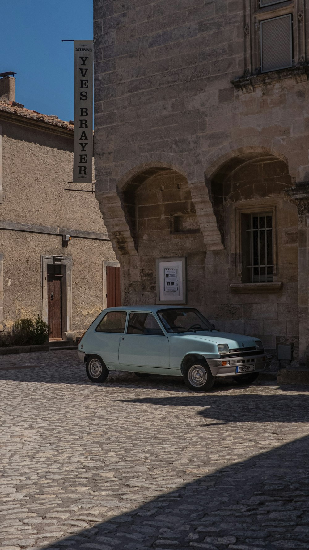 a car parked in front of a building