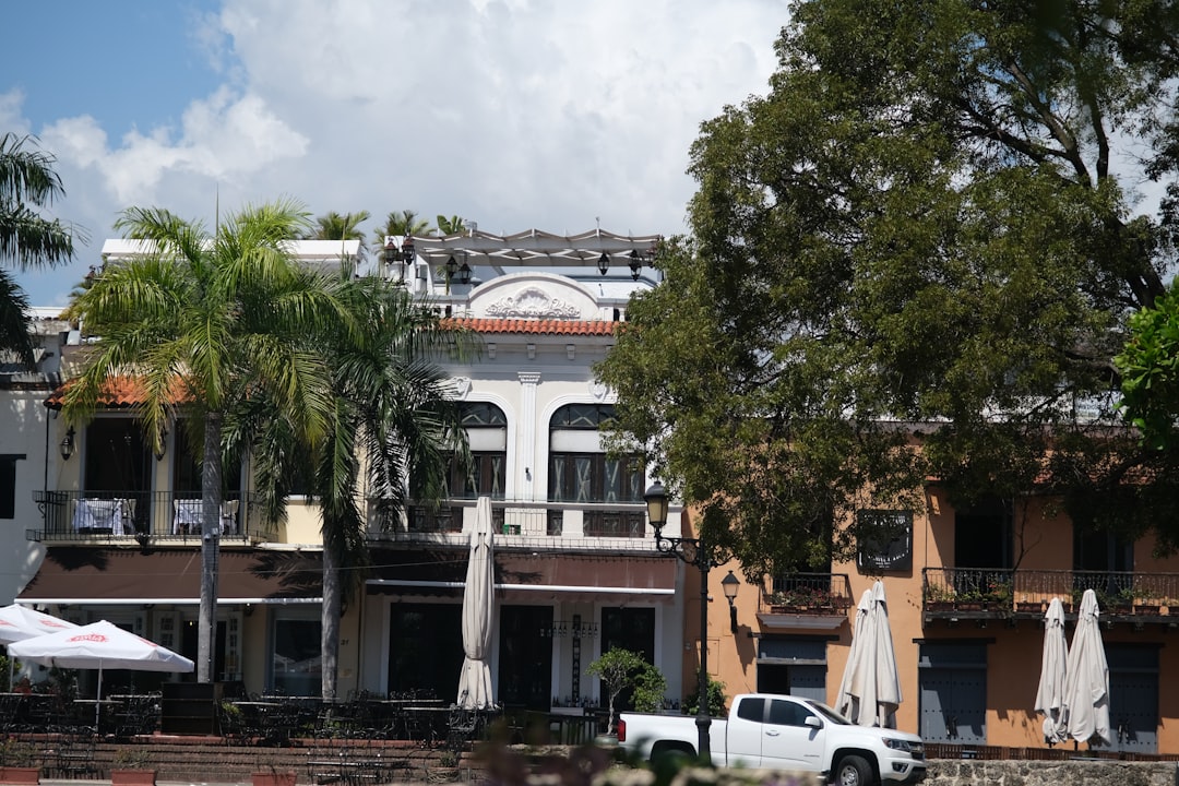 a white building with a dome roof,
