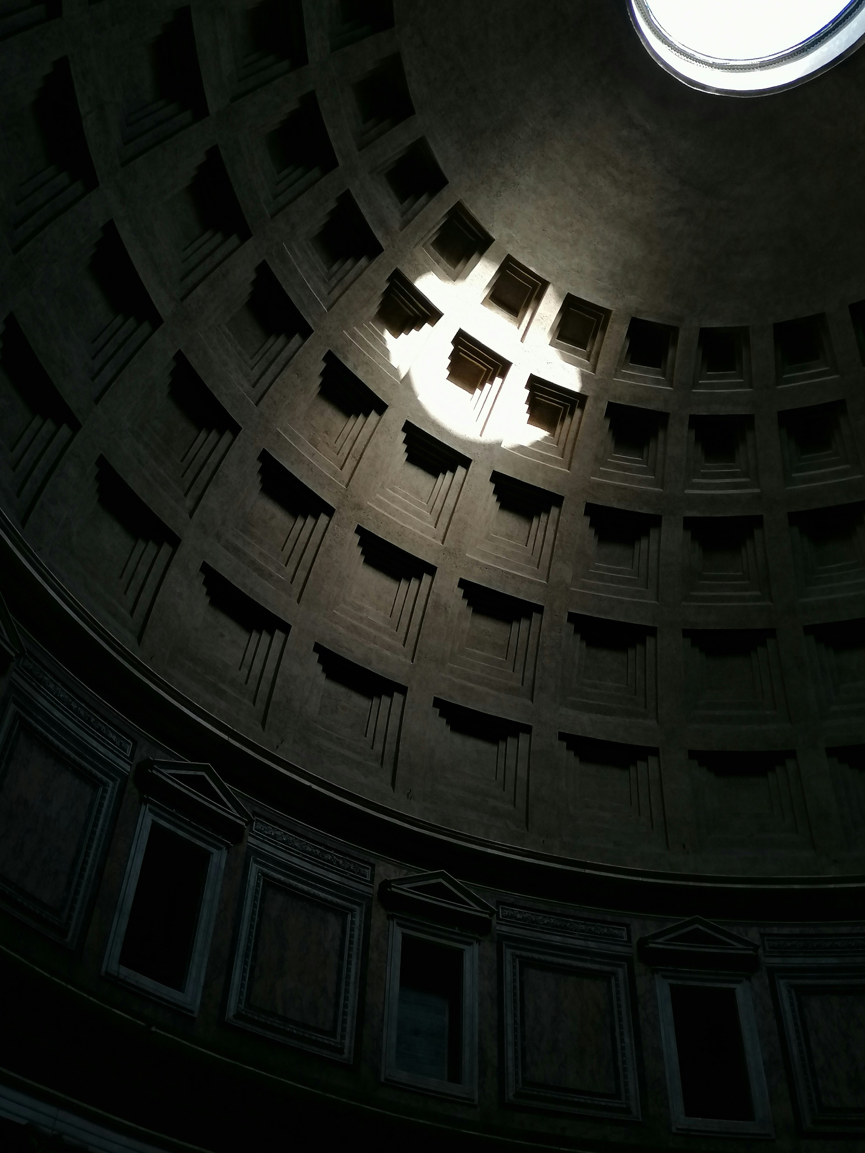 Side view of Pantheon Oculus with circular light on the vault