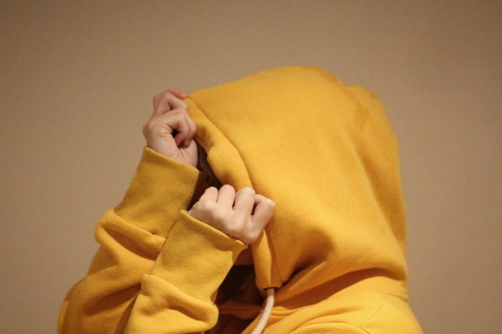 a person in a yellow robe