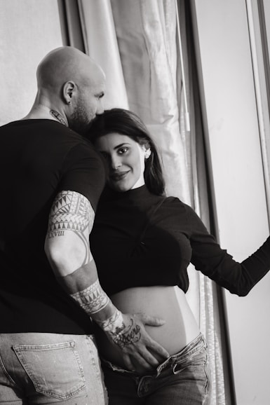 a man and woman posing for a picture
