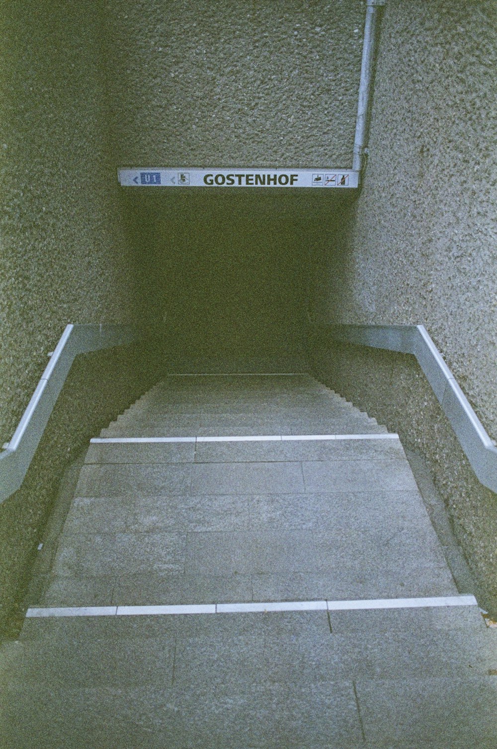 a concrete floor with a sign on it