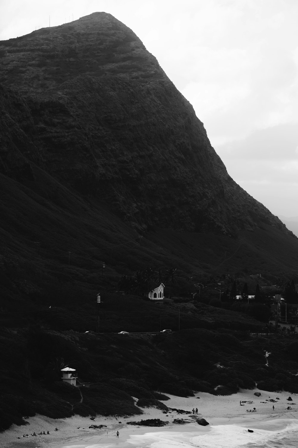 a mountain with a house on it