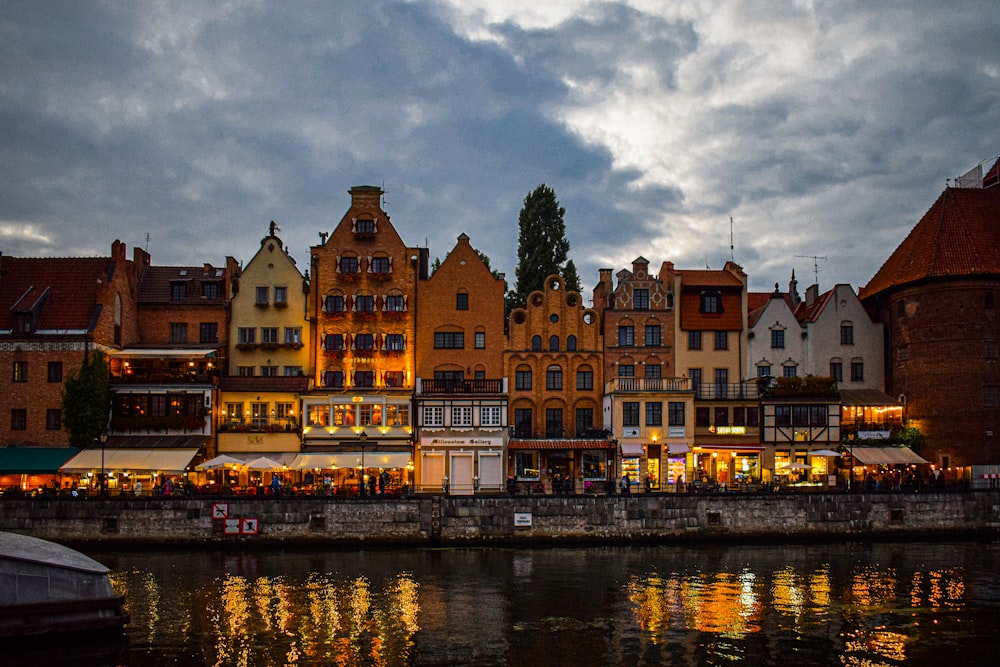 a body of water with buildings along it