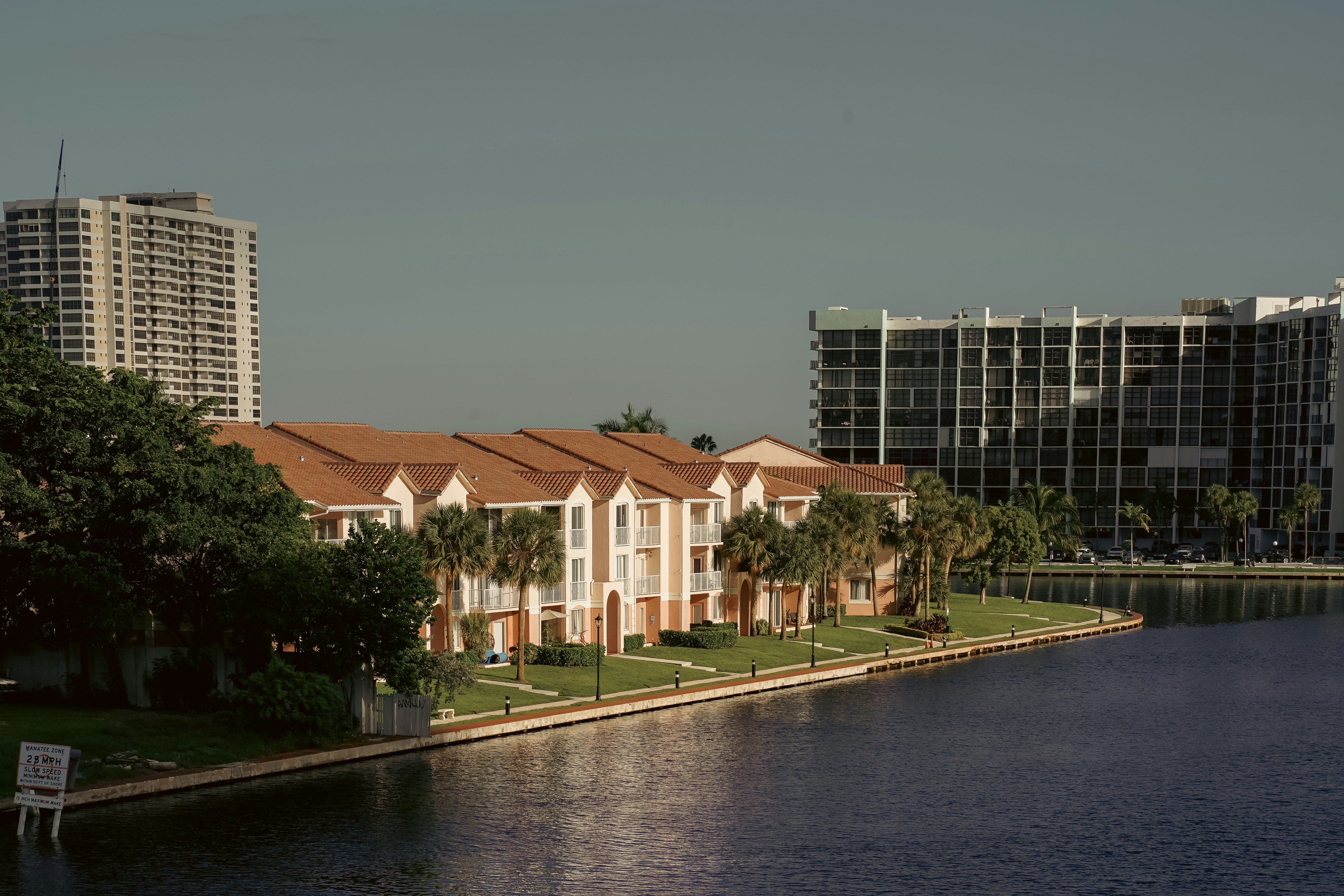 a building next to a body of water