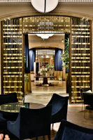 Interior renovation scene featuring elegant lighting and sleek finishes in black and gold.