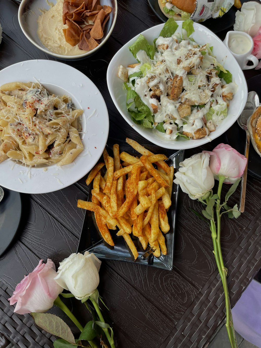 a table full of plates of food