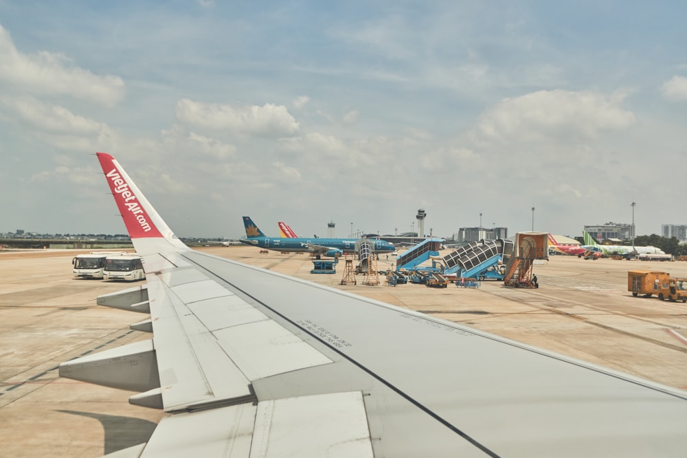 an airplane is parked at an airport