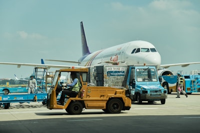 a truck with a plane on top