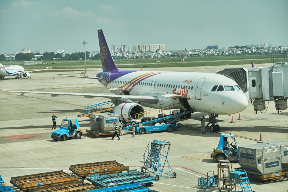 a large airplane is parked at an airport