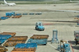 a truck parked on a runway