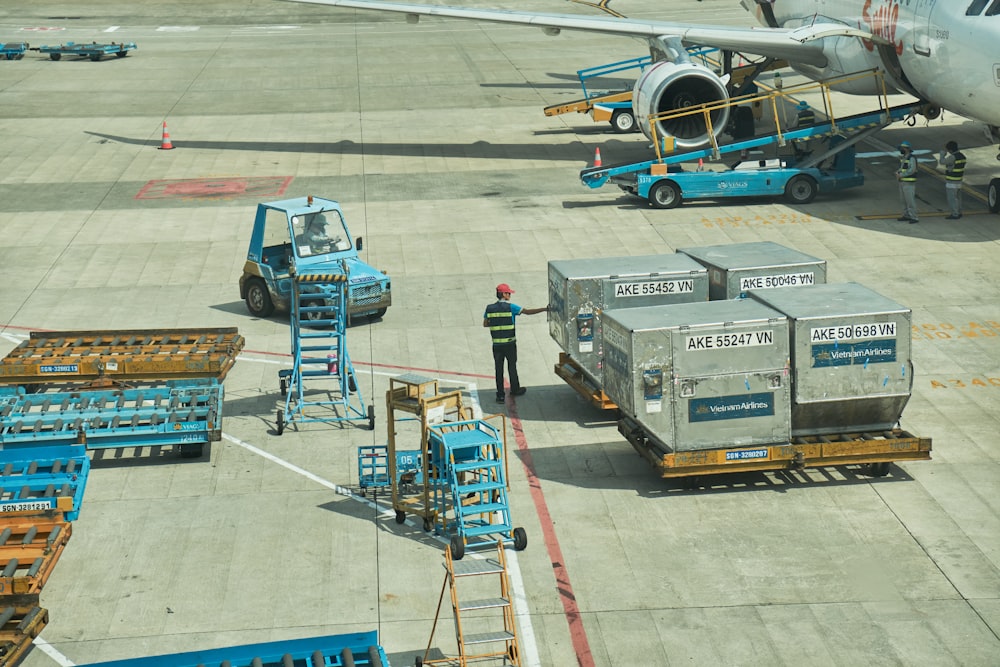 a person standing next to an airplane