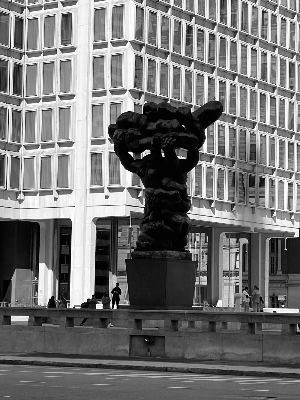 a statue in front of a building