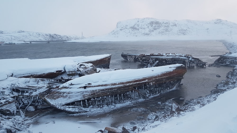 a large building surrounded by snow