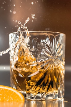 a glass with water and leaves