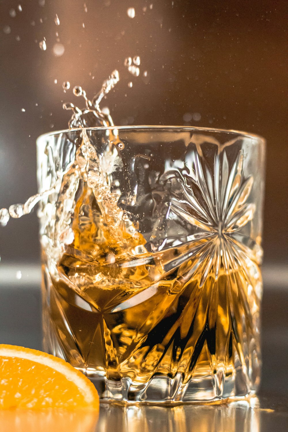 a glass with water and leaves