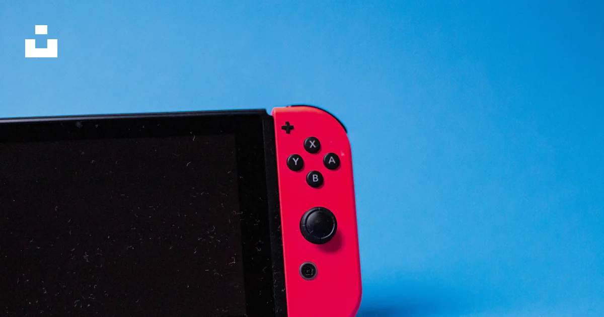 Nintendo Small Rectangular A couple of black rectangular devices photo – Free Nintendo switch ...