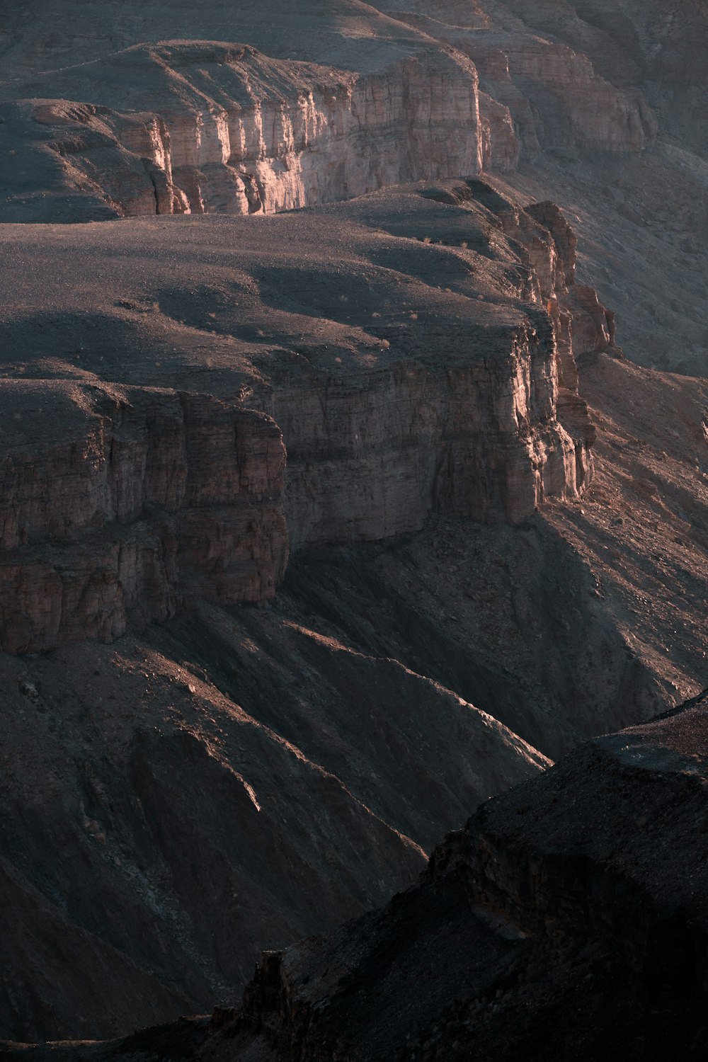 a canyon with a river running through it