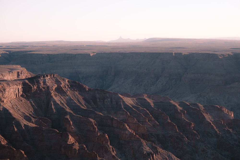 a large canyon with a river running through it