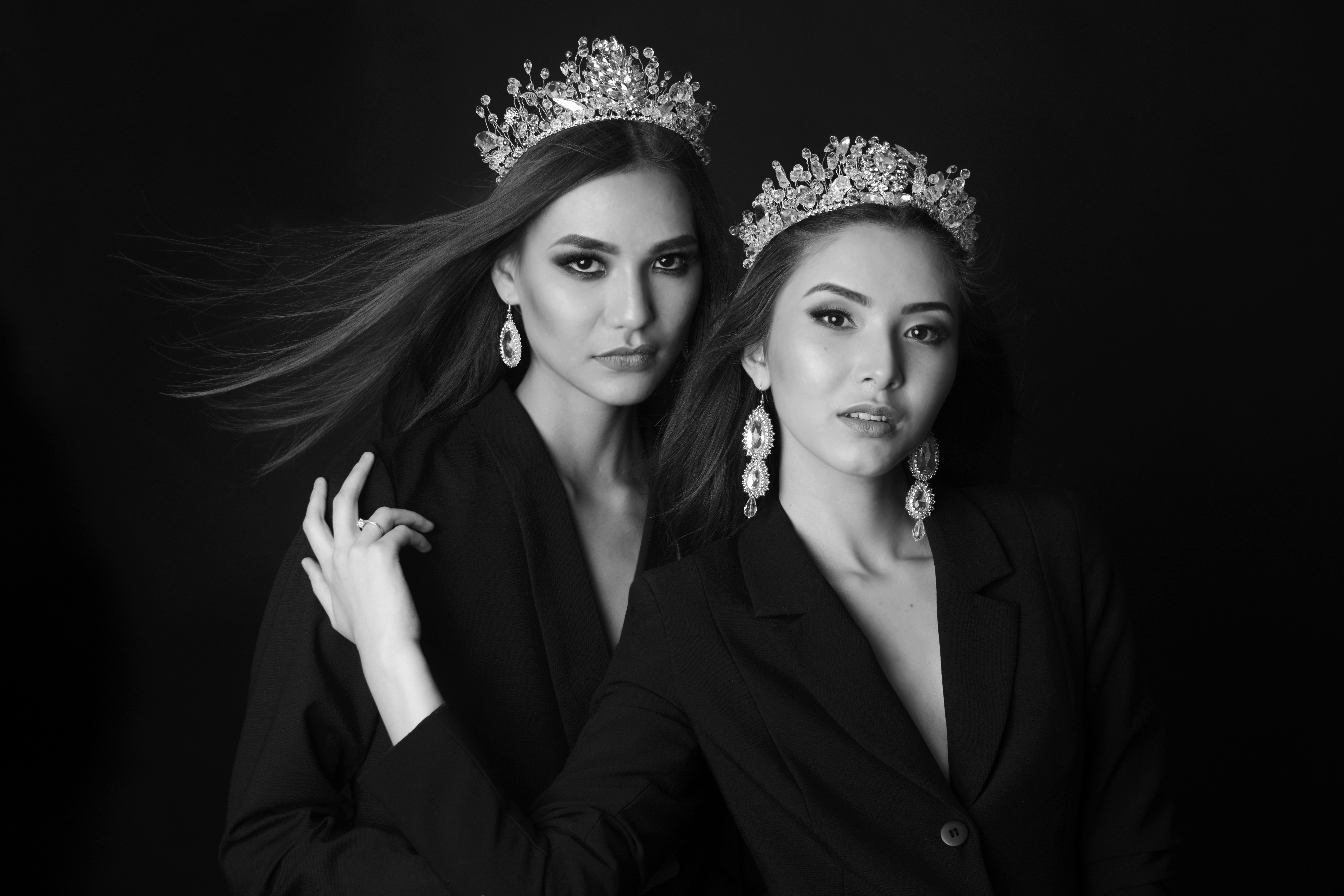 a couple of women posing for the camera