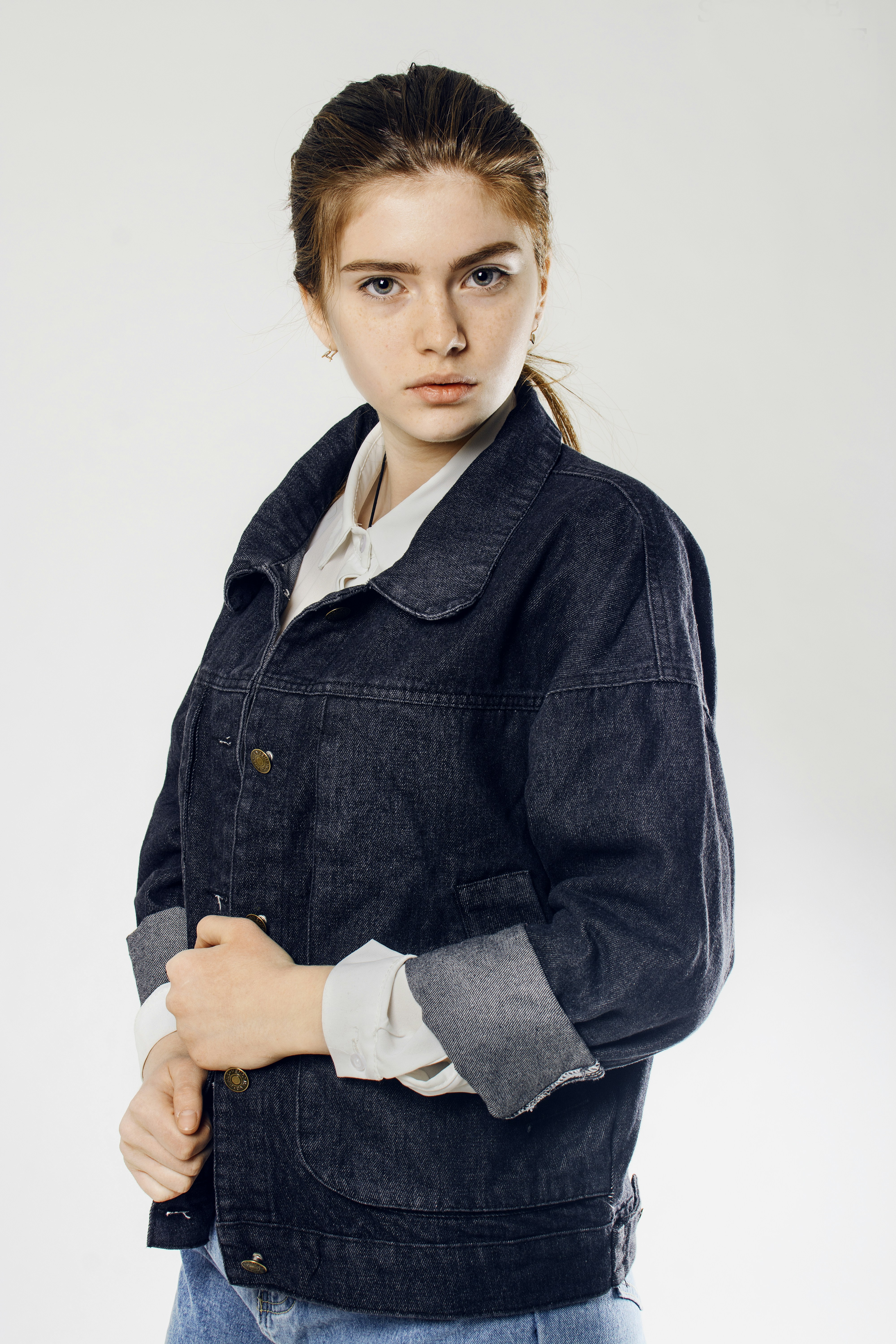 a person with the arms crossed