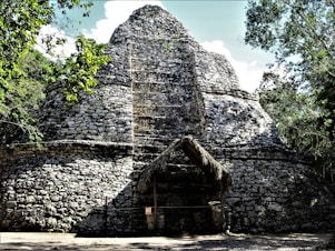 a stone building with a door
