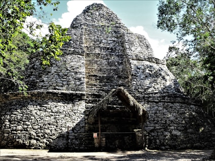 a stone building with a door