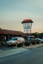 a car parked outside a restaurant