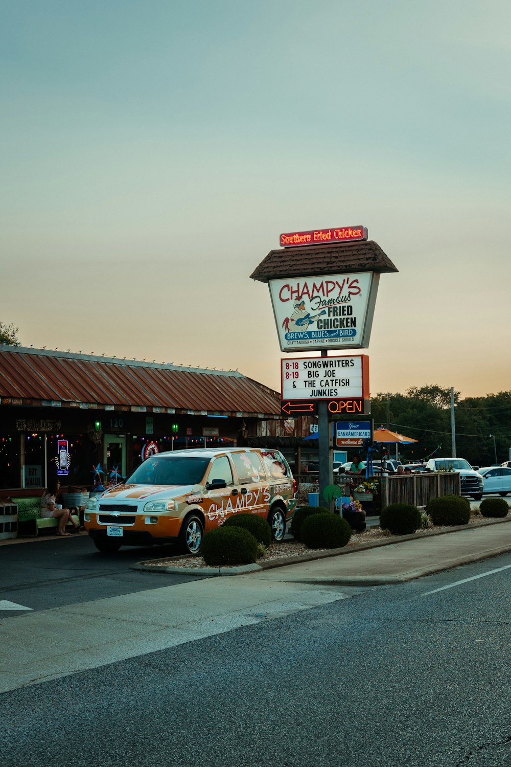 a car parked outside a restaurant