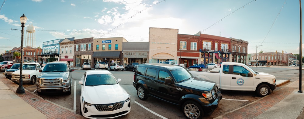 a group of cars parked on the side of a road