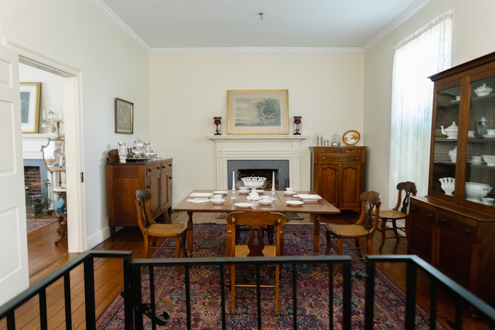 a dining room with a fireplace