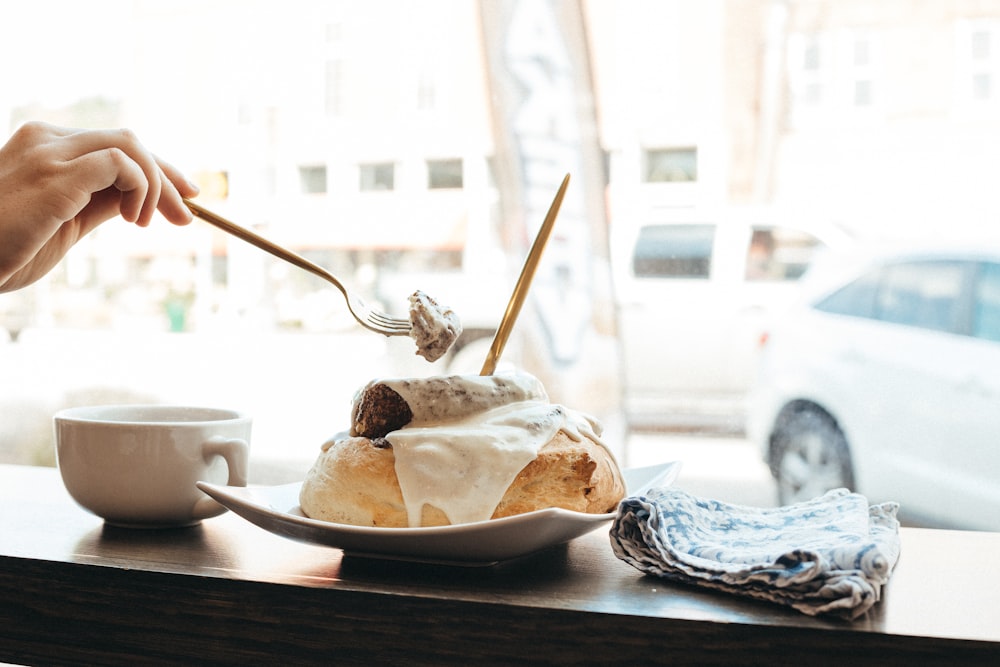 a person eating a dessert