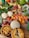 A vibrant spread of fresh fruits and vegetables on a wooden table.