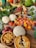 A vibrant spread of fresh fruits and vegetables on a wooden table.