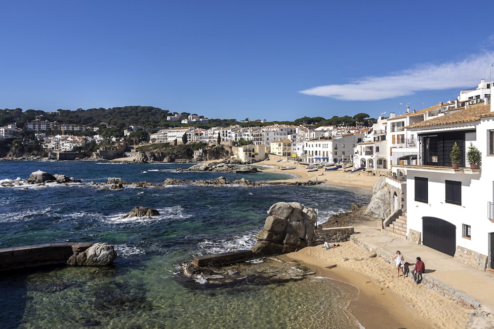 a beach with buildings along it