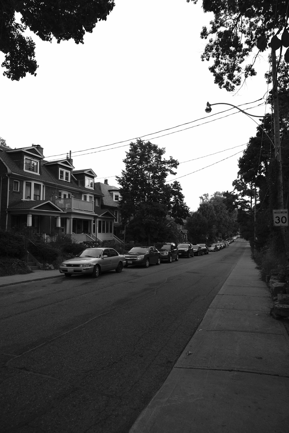 a street with cars parked along it