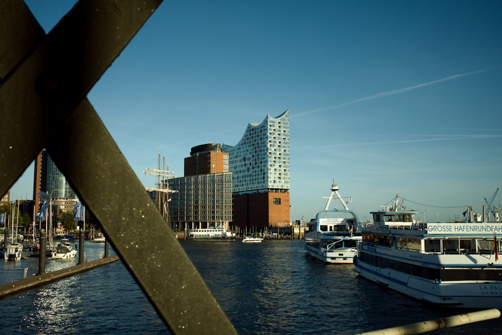 a bridge over a body of water with boats on it