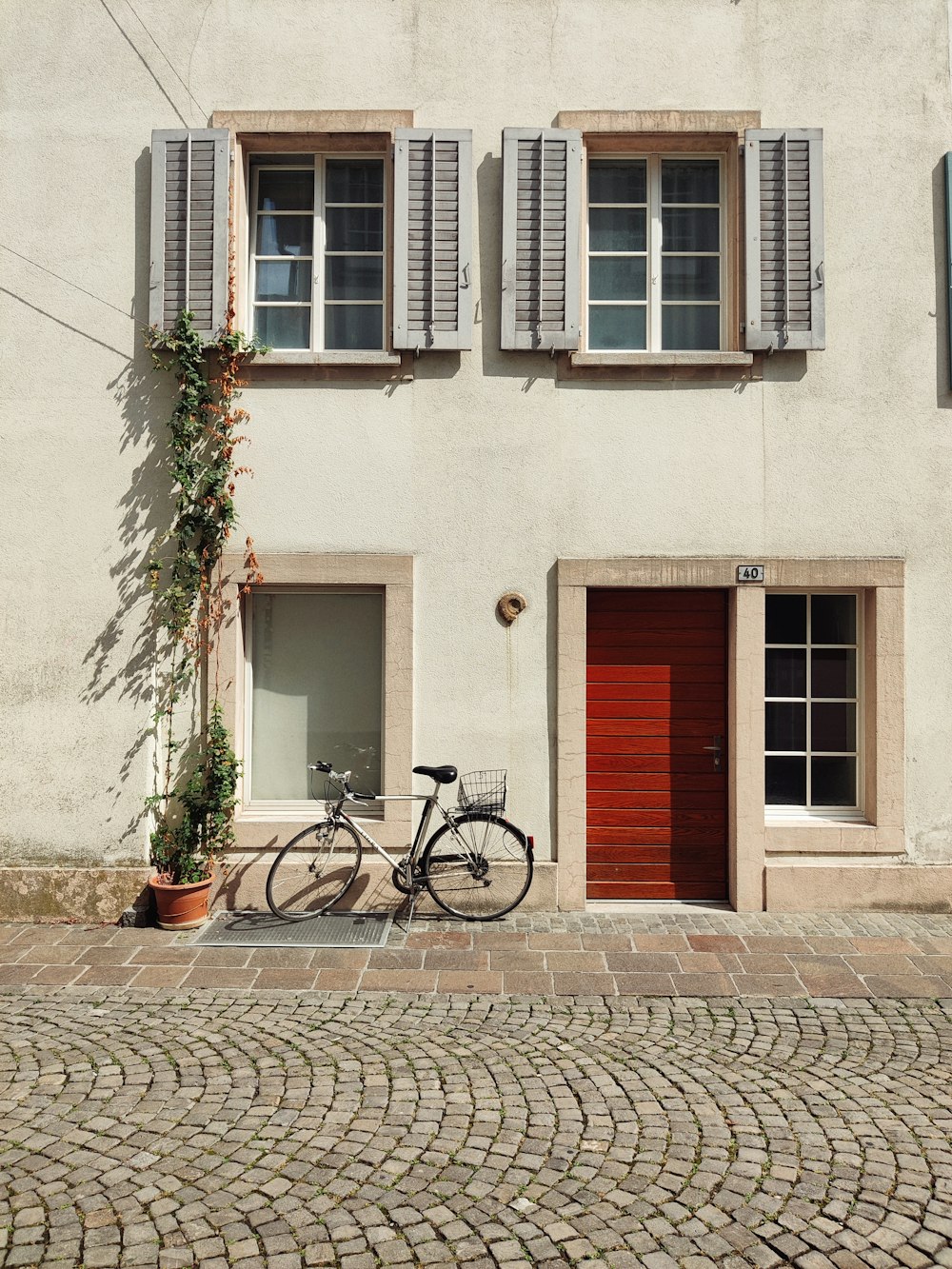 a bicycle parked in front of a building