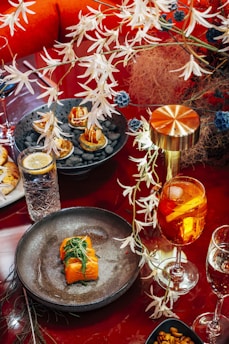 A vibrant dining scene showcasing gourmet dishes at Sago Company.