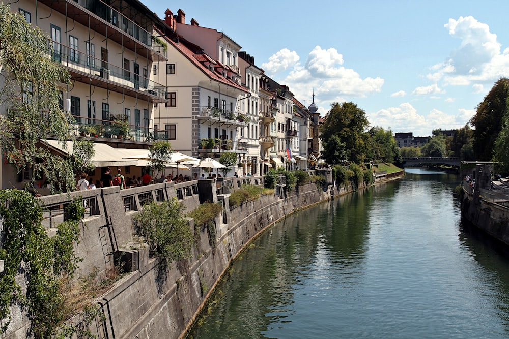 a river with buildings along it