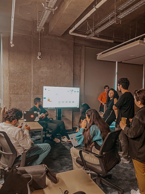 Close-up of a successful project presentation with engaged clients and team members