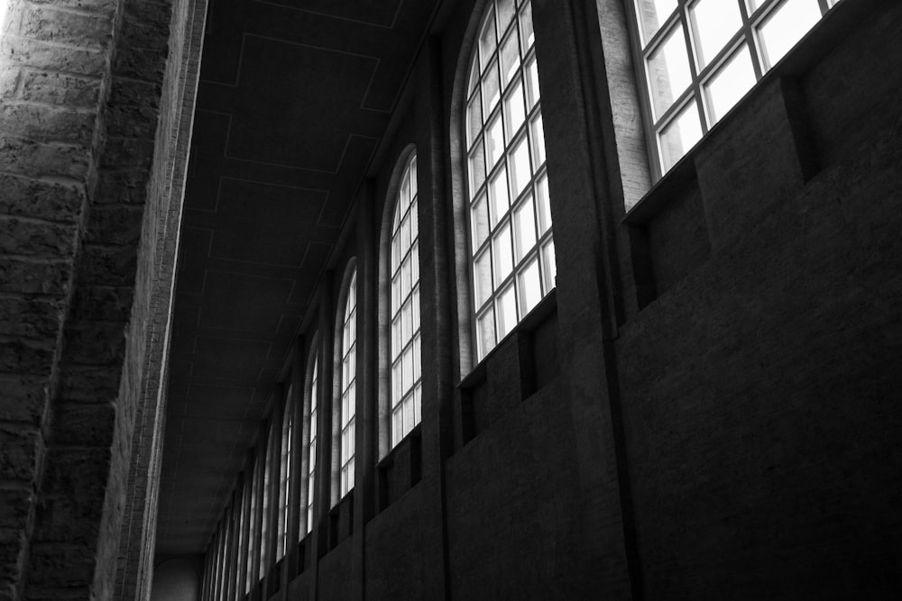 a couple of windows in a stone building